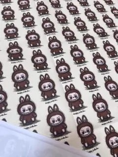 ラブブ　ブラウンキャラクター柄の布地　140*45cm