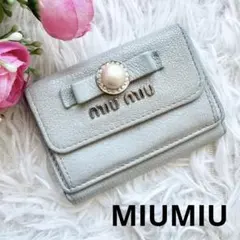 MiuMiu ミュウミュウ 三つ折り財布 ギンガムチェック 水色 - メルカリ