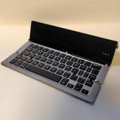 【ジャンク】iEGrow折畳みワイヤレスBluetoothキーボード，スタンド付のサムネイル