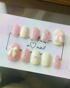 ピンク×クリーム　ネイルチップ　リボン　ネイル　ドット　水玉　モナキ