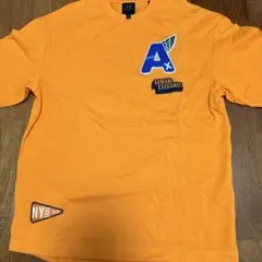 Armani Exchange オレンジ Tシャツ