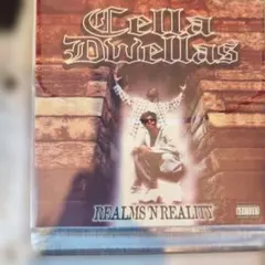 Cella Dwellaの1stアルバム『Realms 'N Reality』
