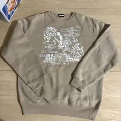 ベージュ プリントスウェット トレーナー