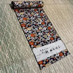 【新品未使用】花の秋田おばこ紬＜古典紬・鮮やか花々尽くし文＞着尺　ウール化繊混紡のサムネイル