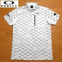 オークリー ゴルフウェア 半袖ポロシャツ Lサイズ スカル 総柄 極美品のサムネイル