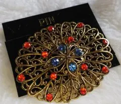 昭和レトロ　　金色の花型ブローチ