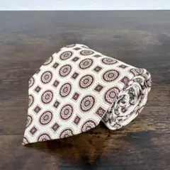 【美品】T.umar 高級メダリオン小紋柄　ネクタイ シャンパンゴールド