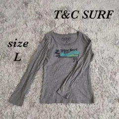 T&C SURF (L) オーバルネック ロンT フロントロゴ ラメプリント