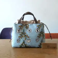 あおりポケットの巾着バッグ＊ミナペルホネン pomppia - メルカリ