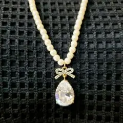 Feroux︎ ❤︎‬ティアドロップリボン❤︎ビジューパールロングネックレス
