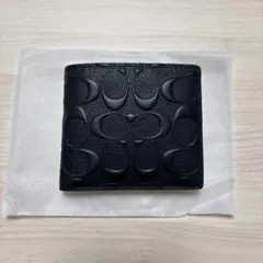 新品未使用 COACH シグネチャー 2つ折り財布 メンズのサムネイル