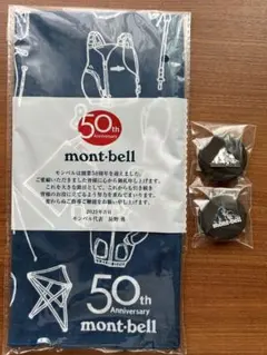 新品未開封 モンベル 50周年記念バンダナとピンバッジ2個セット