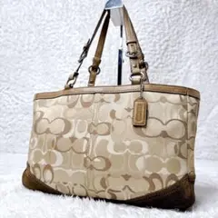 COACH エルゴ シグネチャー キスロック プリーテッド ワンショルダー
