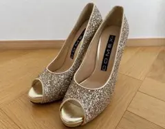 美品 コメックス ヒールパンプス グリッターラメ ゴールド　23cmのサムネイル