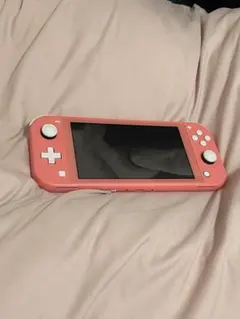 Nintendo Switch Lite 本体 コーラル&ケース付き - メルカリ