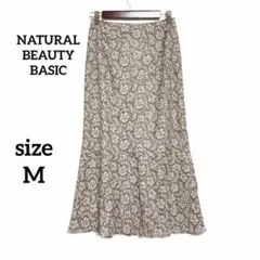ナチュラルビューティーベーシック　花柄フレアロングスカートM 総レース　グレー系
