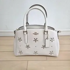 らんちゃん様専用※COACH 花柄パンチングラメショルダーバッグ - メルカリ