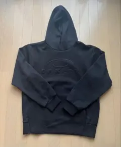 OAKLEY ブラック ロゴ入り パーカー