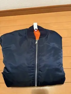 オレンジ ブルゾン