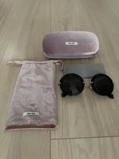 MIU MIU ブラック サングラス ケース・箱付き miu miu ブラック サングラス ケース付き - メルカリ