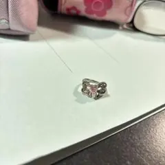 4℃リボンモチーフ シルバーリング ピンクストーン