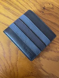 COACH二つ折り財布 シグネチャーカードケース付き黒地に青と紺のストライプ