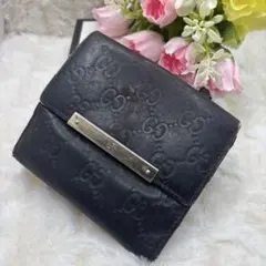 GUCCI ✨ブラック系　レザー 二つ折り財布　シマレザー　GG柄　金プレート
