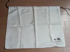 COACH アイボリー収納袋