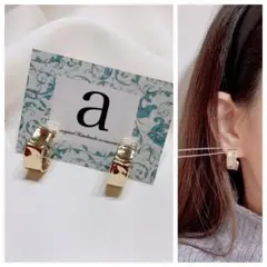 2305☺︎ゴールドのウェーブ半円フープチタンピアス☺︎