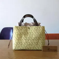 あおりポケットの巾着バッグ＊ミナペルホネン pomppia - メルカリ