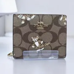 【新品未使用 】COACH コーチ 二つ折り財布 猫 シグネチャー CC922のサムネイル