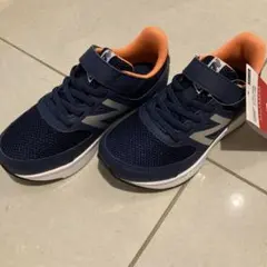 New Balance ネイビー/オレンジ スニーカー