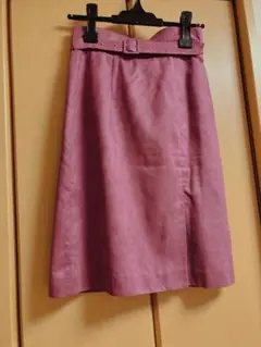 プロポーション ボディドレッシングのピンク ベルト付き タイトスカート