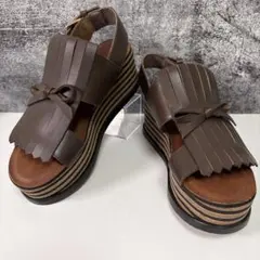 極美品 KISCO サンダル フリンジ タッセル 厚底 アンクルベルトのサムネイル