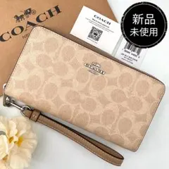新品】COACH コーチ☆長財布 ベージュ ストラップ - メルカリ