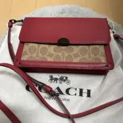 coachミニショルダーバック　シグネチャー柄赤レザー保存袋付き