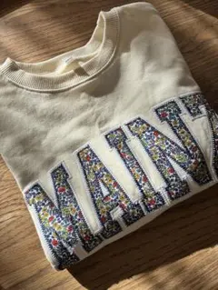 cocaトレーナー クリーム色