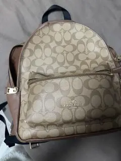 〔新品未使用〕COACH C2002 ブラウン　ロゴパターンミニリュック 新品未使用〕COACH C2002 ブラウン ロゴパターンミニリュック - メルカリ