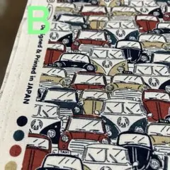 車柄の綿プリント生地