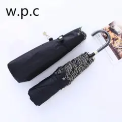 新品　wpc 遮熱・遮光ミニパラソル 軽量 折り畳み傘　星柄 日傘　黒のサムネイル