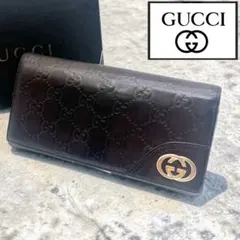 《良品》GUCCI グッチ 長財布 シマ GG柄 エンボス加工 ダークブラウンのサムネイル