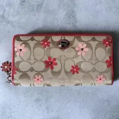 美品COACH 長財布 デイジー　シグネチャー 花柄 ラウンドファスナー　ピンクのサムネイル