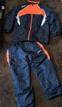 ASICS ナイロンジャケットとパンツセット ネイビー/オレンジ