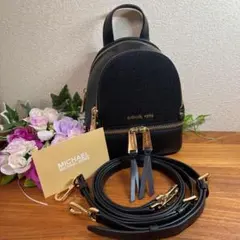 D5023 【マイケルコース】ミニ パーフォレイテッド レザー バッグパック