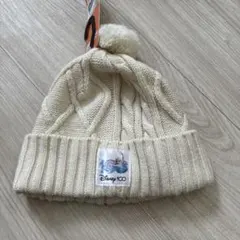 新品タグ付き　Disney 100 アイボリー ニット帽 ポンポン付き　アナ雪