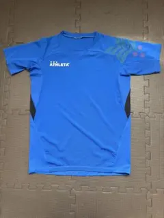 ATHLETA 青 シャツ ジュニア