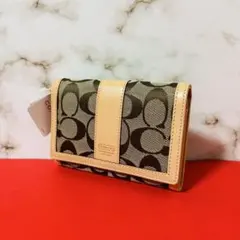 0074 新品、未使用 COACH シグネチャー レディース 折り財布