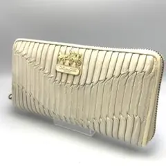 COACH ラウンドファスナー長財布 イントレチャート型押しベージュ ゴールド金
