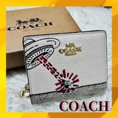 コーチ 二つ折り財布 ディズニー キース・ヘリング 財布 coach - メルカリ