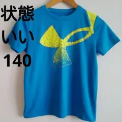 アンダーアーマー青いスポーツTシャツ イエローグラフィックYLG